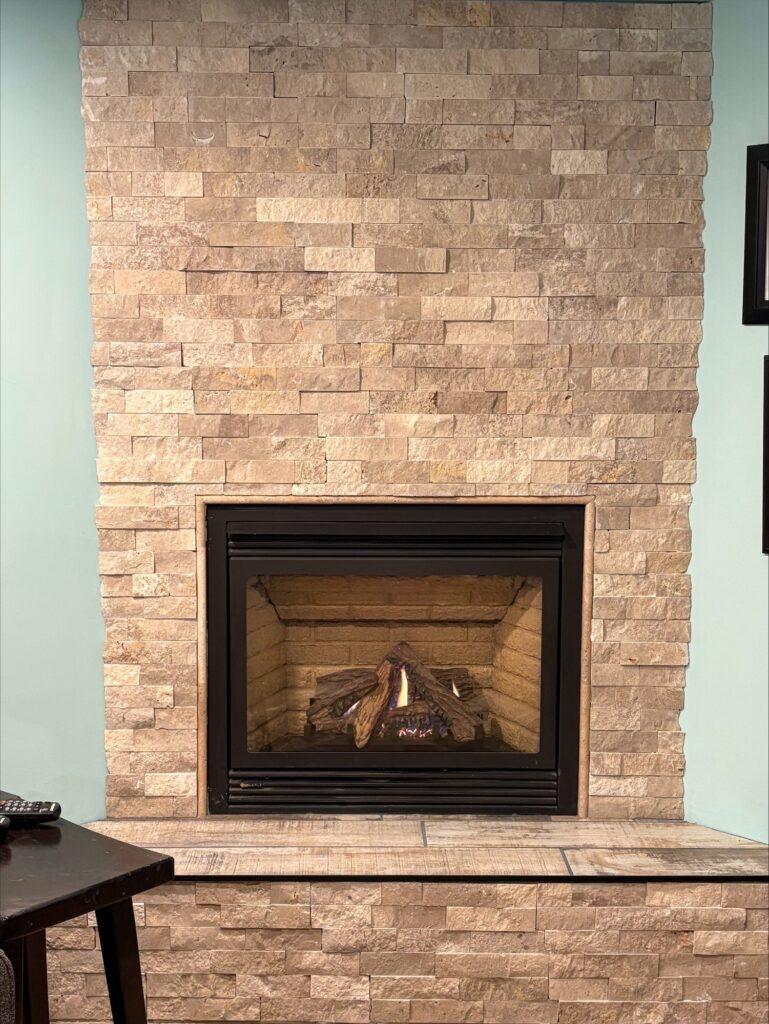 Refaced propane fireplace